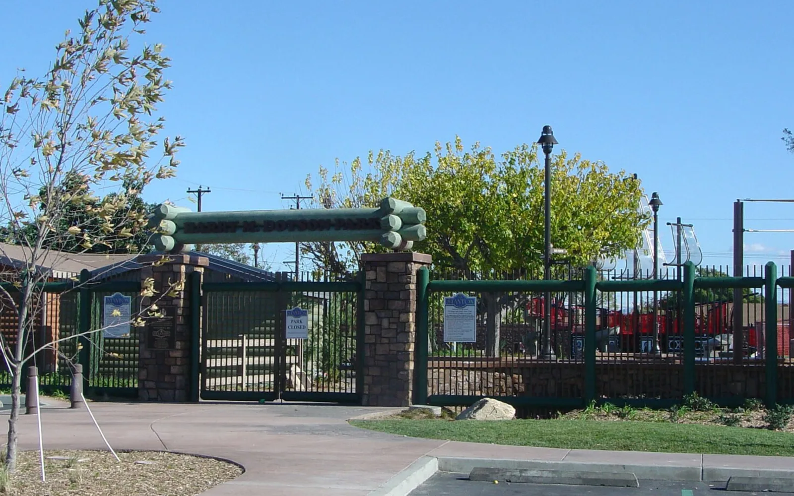 Entrance and playground at Harry M. Dotson Park in Stanton, California
